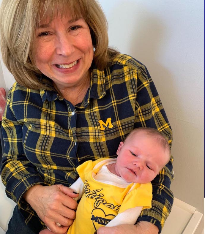 Pam Sexton holding infant grandson