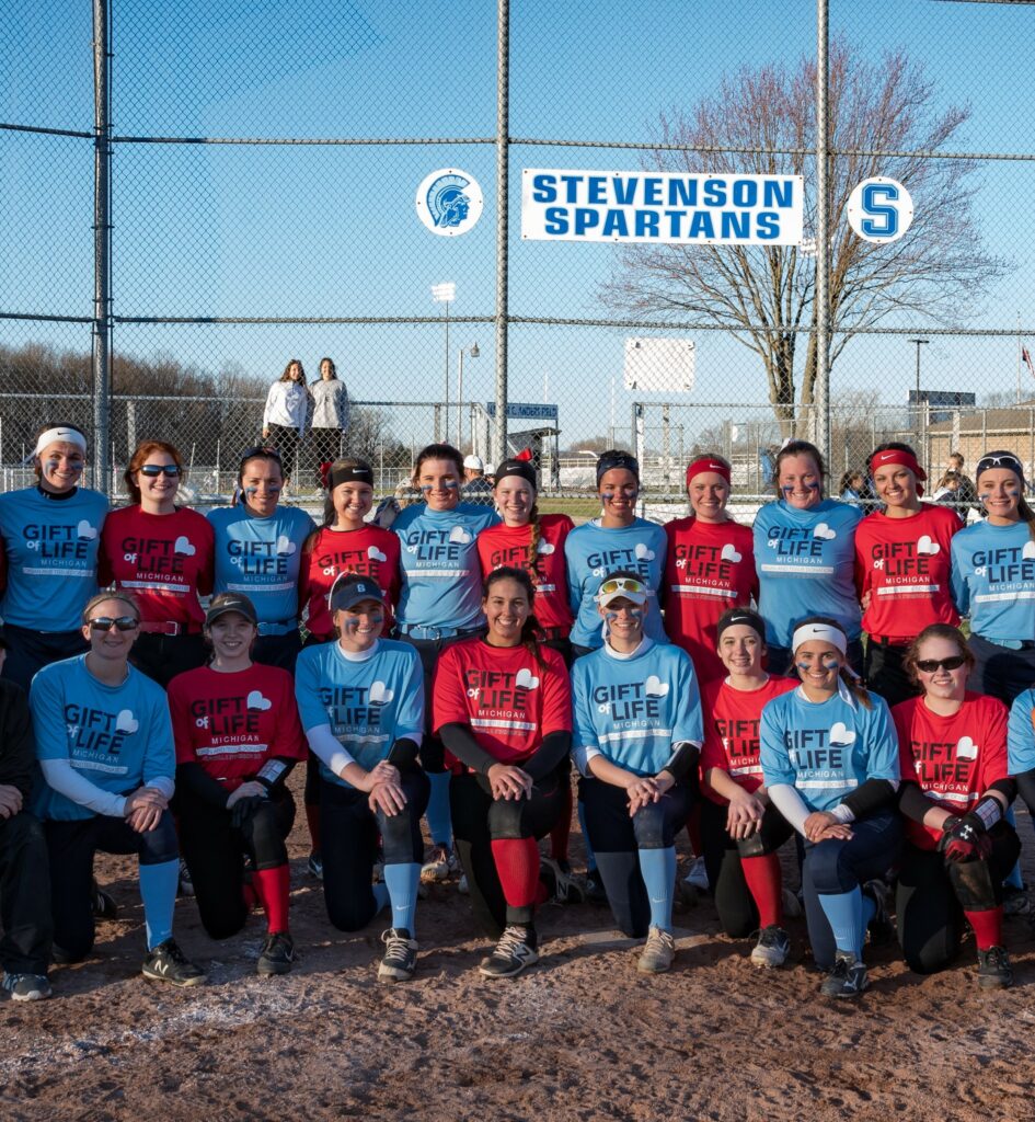 Group photo of two softball teams