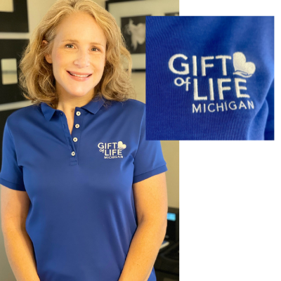 Woman in blue collared shirt with Gift of Life logo