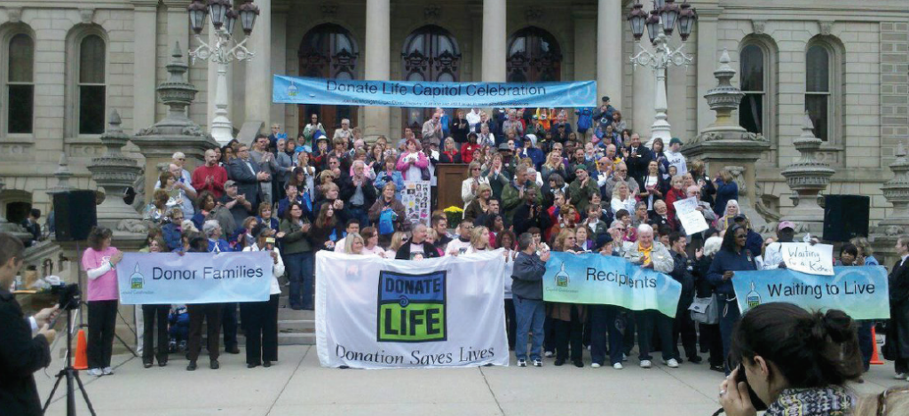 crowd gathered on Michigan state capitol building steps