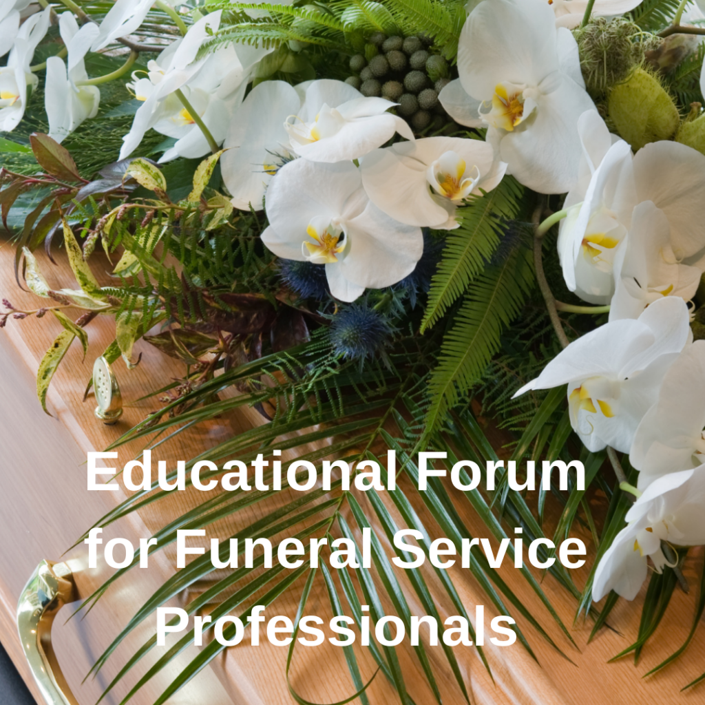 flower-covered wooden casket