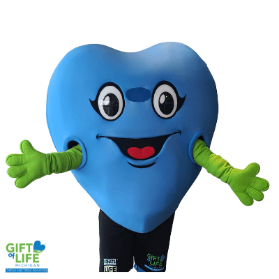 Giant blue heart with green arms/hands outstretched and a smiling face, big eyes