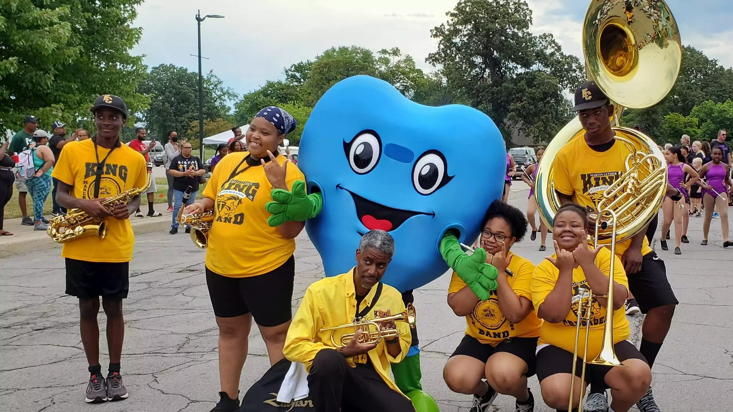 Mascot Hartley with the MLK Marching Band