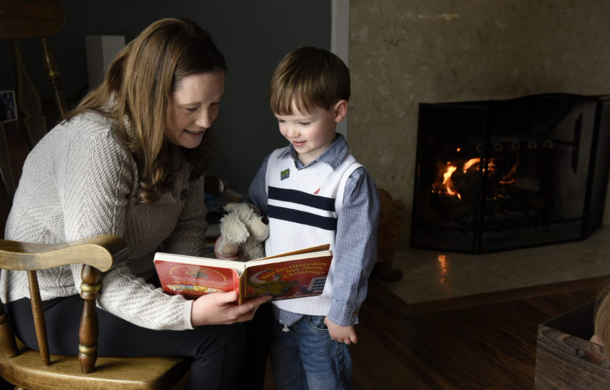 Alyssa Voss reads to her 4-year old son, Coleton