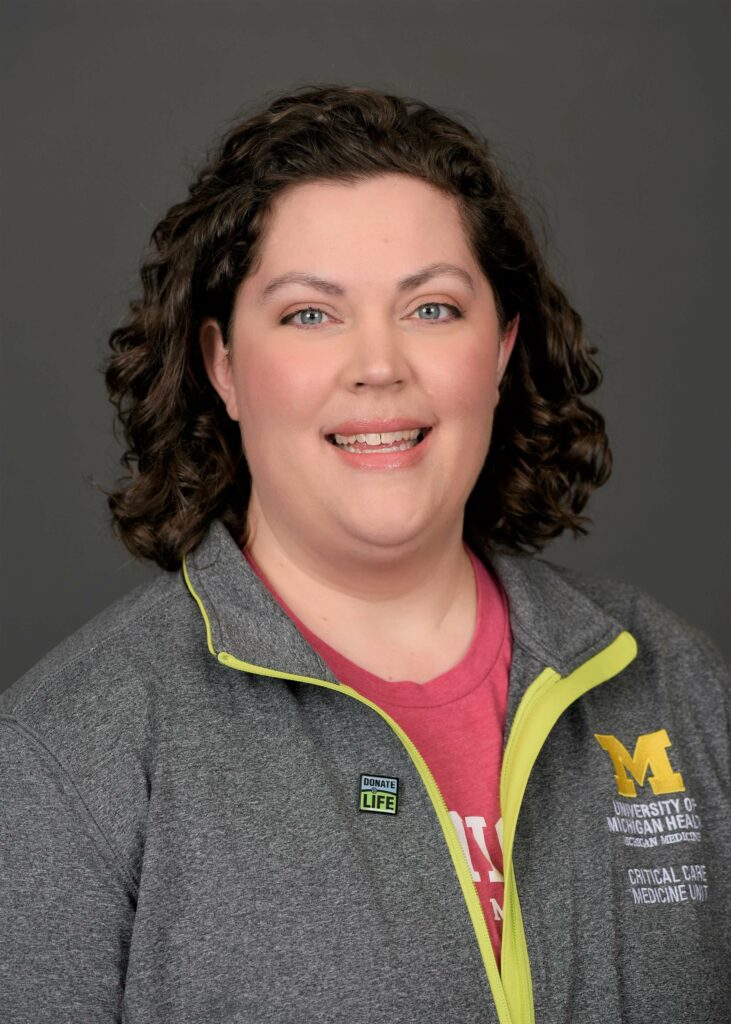 Aimee Yates, a nurse at Michigan Medicine, is receiving the Taking Initiative Award