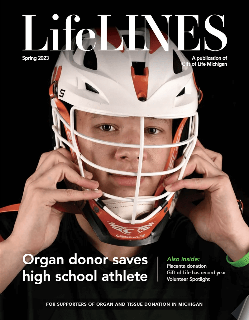 Cover of LifeLINES magazine, featuring Tristan Johnson putting on his lacrosse helmet.