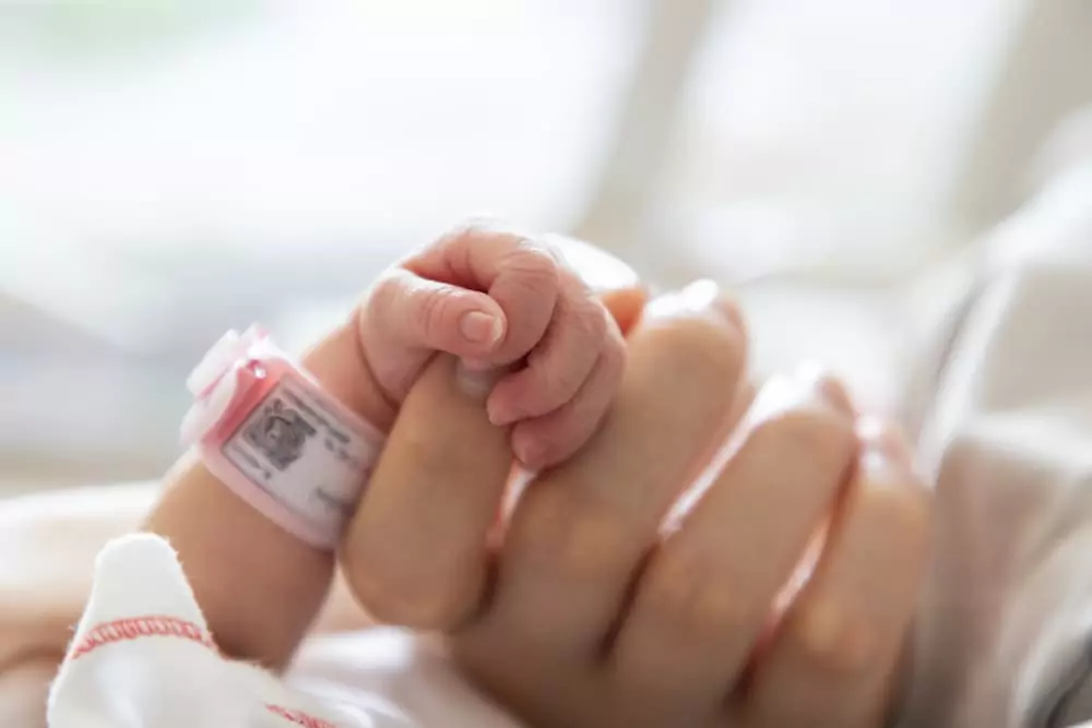 A newborns hand