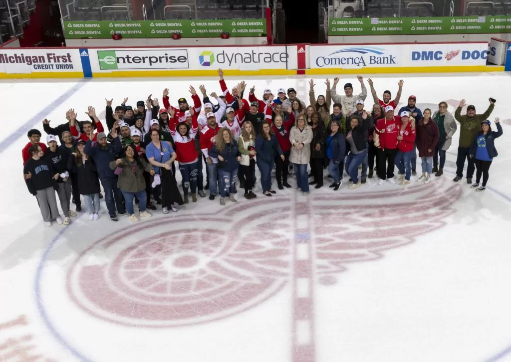 Gift of Life Michigan staff, board members, volunteers and other supporters enjoying a moment on the ice after a Red Wings game in 2023.