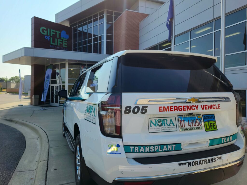 A NORA organ transplant transportation SUV outside the Gift of Life office.