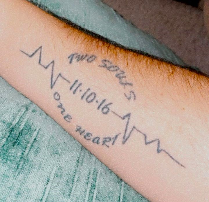Tattoo reading "Two souls, one heart" with the date 11-10-16