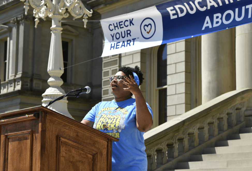 Educator Lyniece McNair-Levi speaks at the 2024 Check Your Heart Capitol Rally