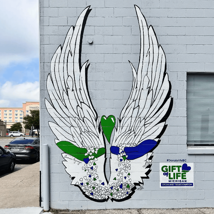 Angel wings mural in downtown Bay City in support of Gift of Life Michigan