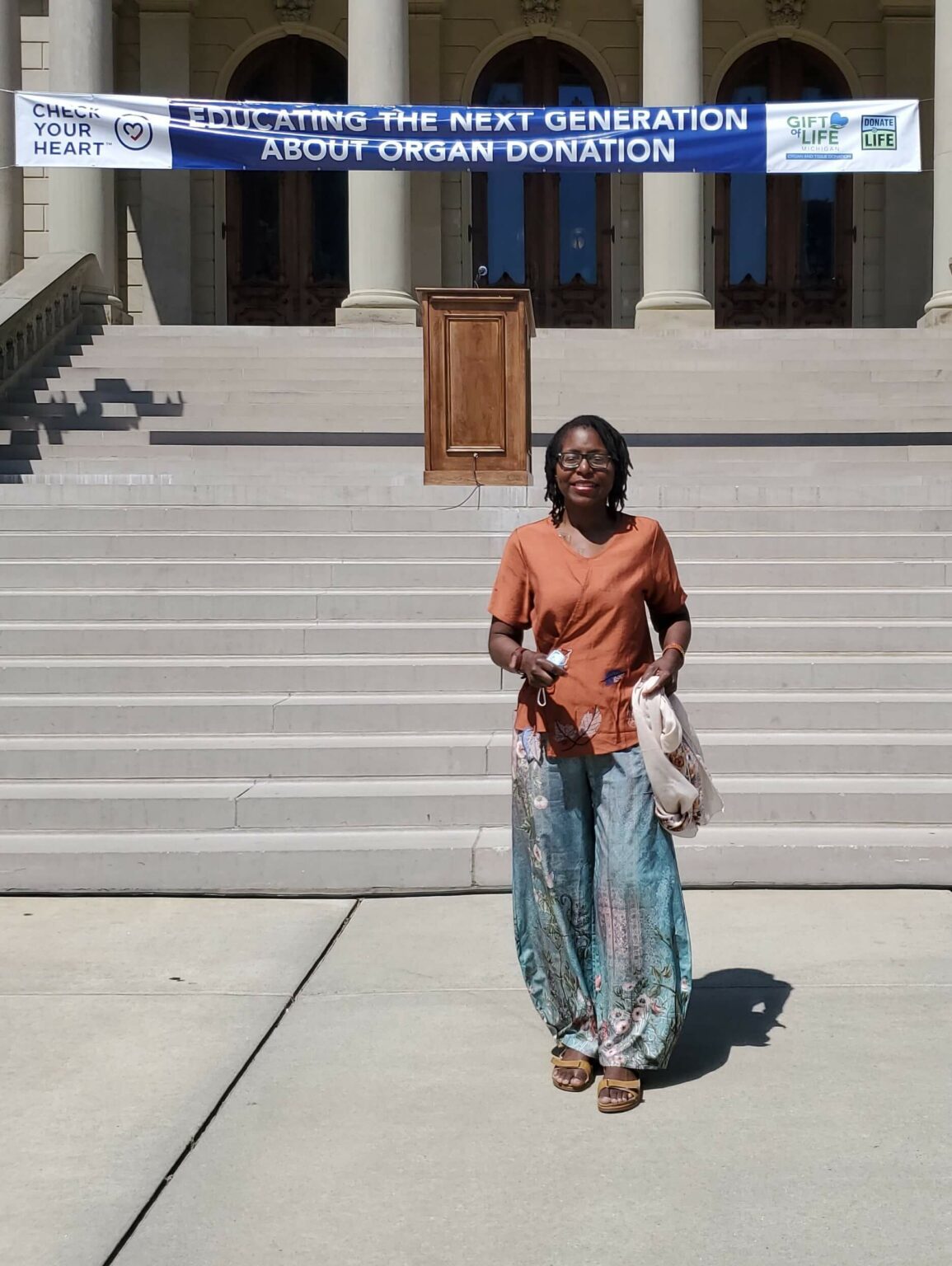 Lisa Haney at the Michigan Capitol steps during the Check Your Heart Capitol Rally