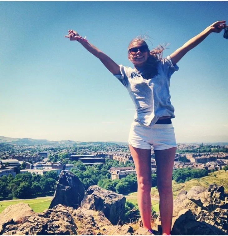 Hailey Brouillet had a fantastic time in Europe shortly before she passed and became an organ donor. Pictured here standing on a mountain overlooking a European city.