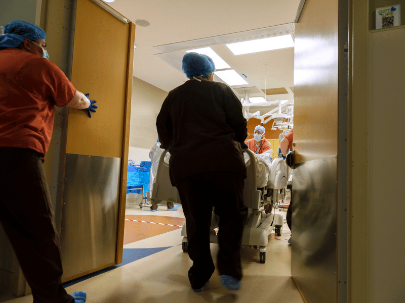 A donor is wheeled into Gift of Life's operating room on a gurney.