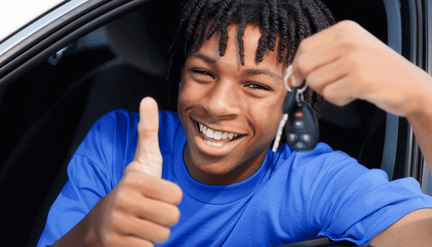 new teen driver with keys to the car