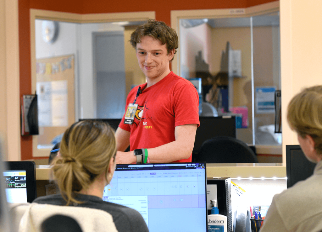 His time as a nurse assistant at Mott helping pediatric heart patients is a full-circle experience for Tommy.