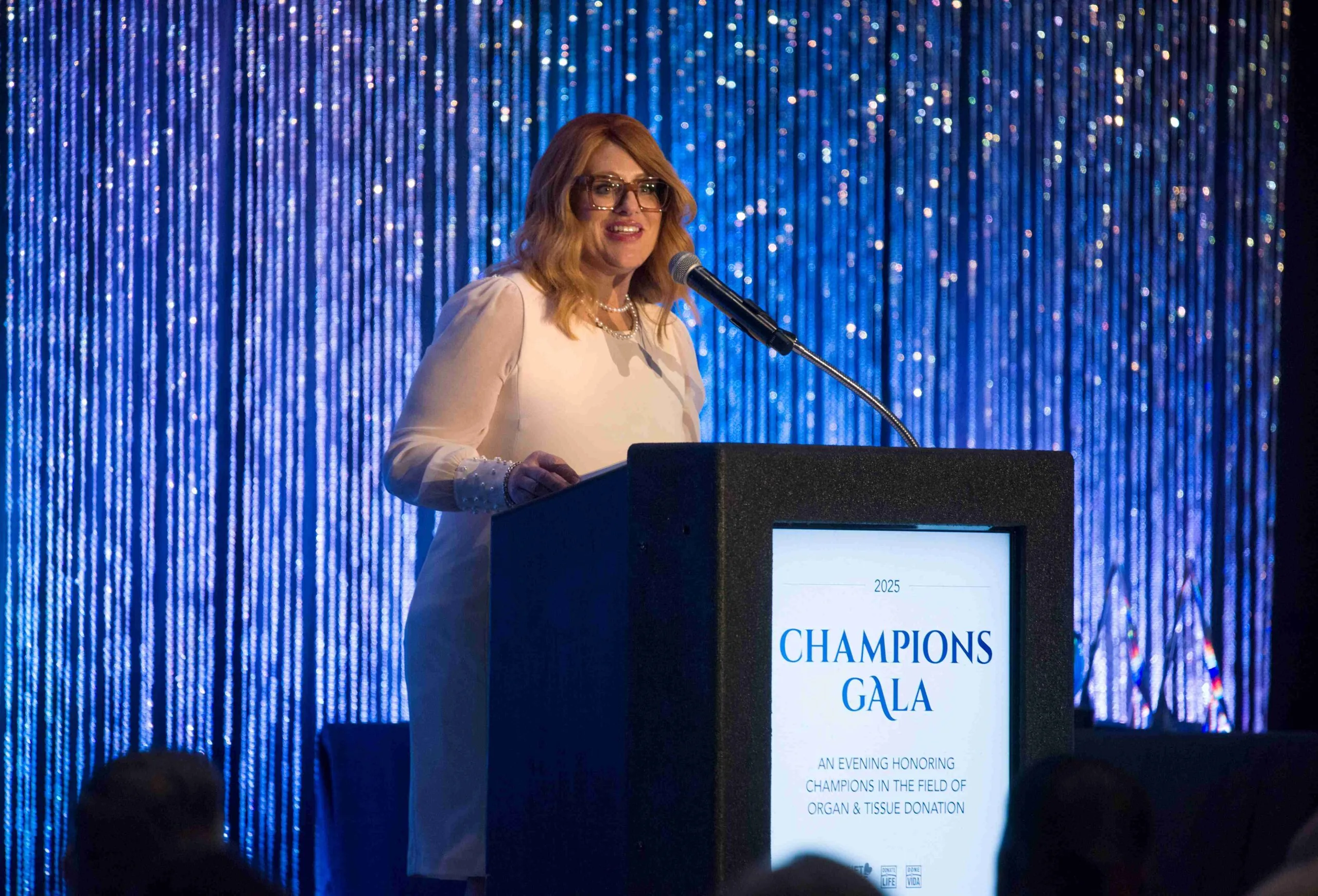 Dorrie at 2025 Champions Gala Dorrie Dils at the podium during the 2025 Champions Gala