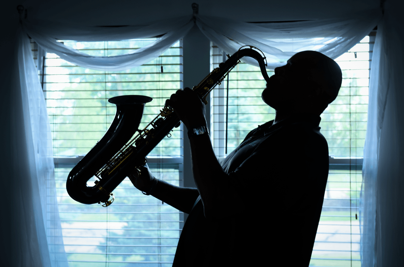 Jay Waller playing his saxophone