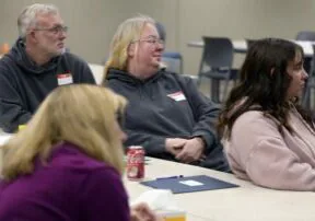 Donor family members listen to a presentation at the Hope for the Holidays event